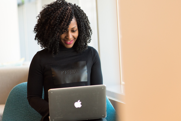 Woman checking her email on computer